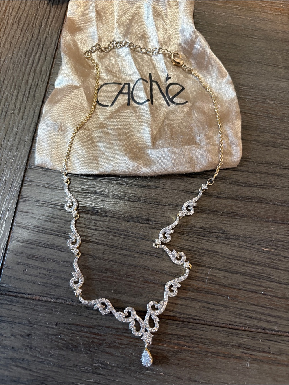 Cache Gold-Tone Crystal Swirl Statement Necklace with Teardrop Pendant